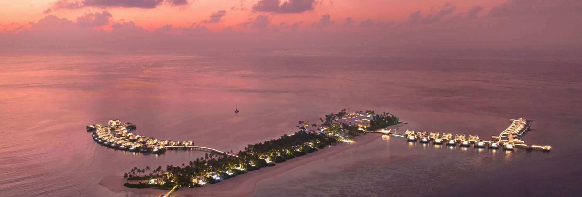 Jumeirah Maldives_High_resolution_300dpi-Jumeirah Maldives - Full Island Aerial Early Evening
